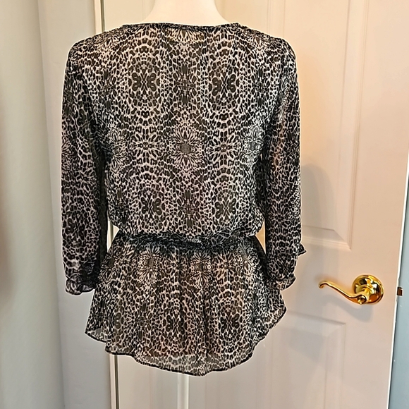 Never been worn!! Black and Gray sheer animal prints top. 3/4 sleeves size Small - Picture 3 of 5